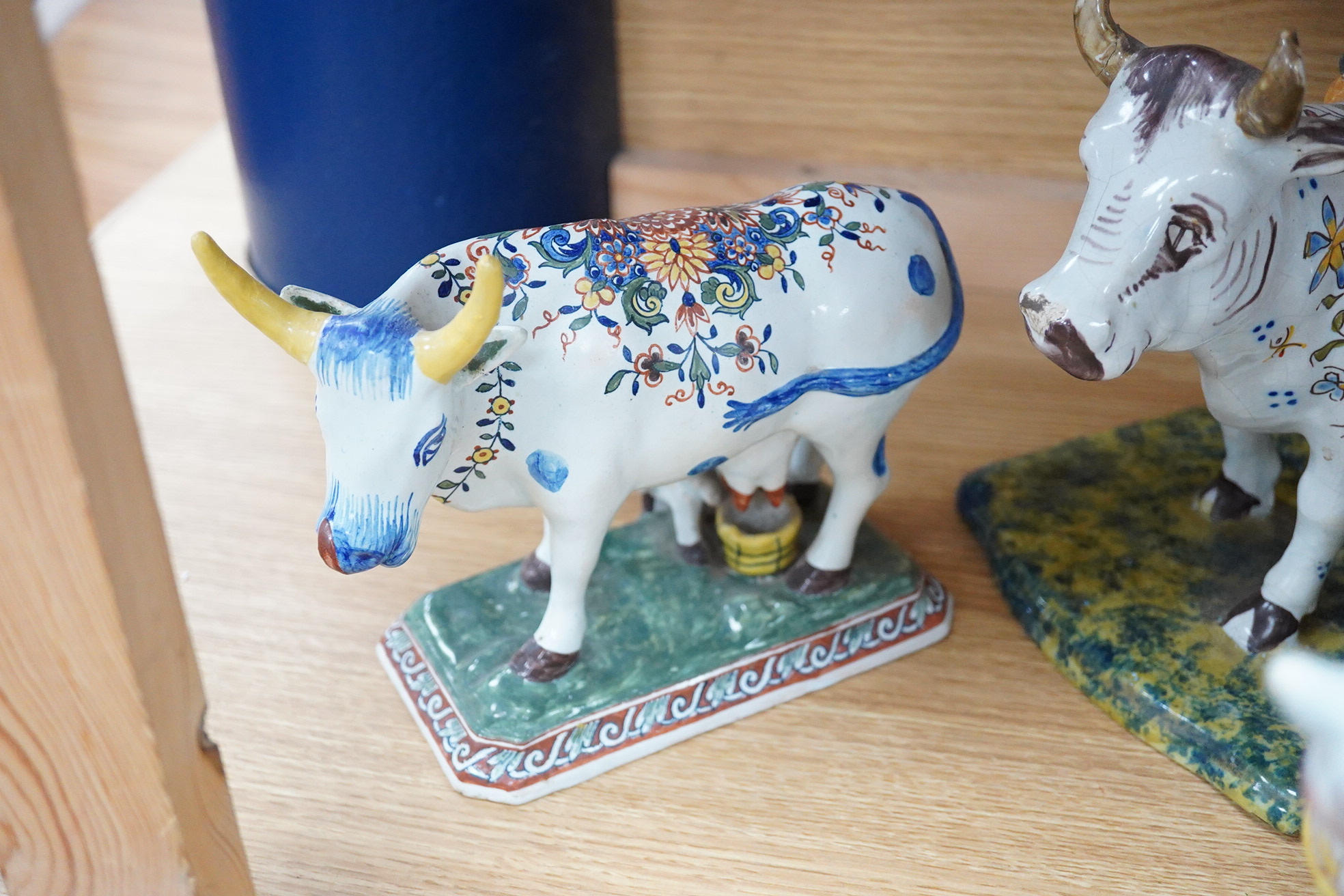 19th century French faience models of cows, a cat and a frog .(9), Tallest 30 cm